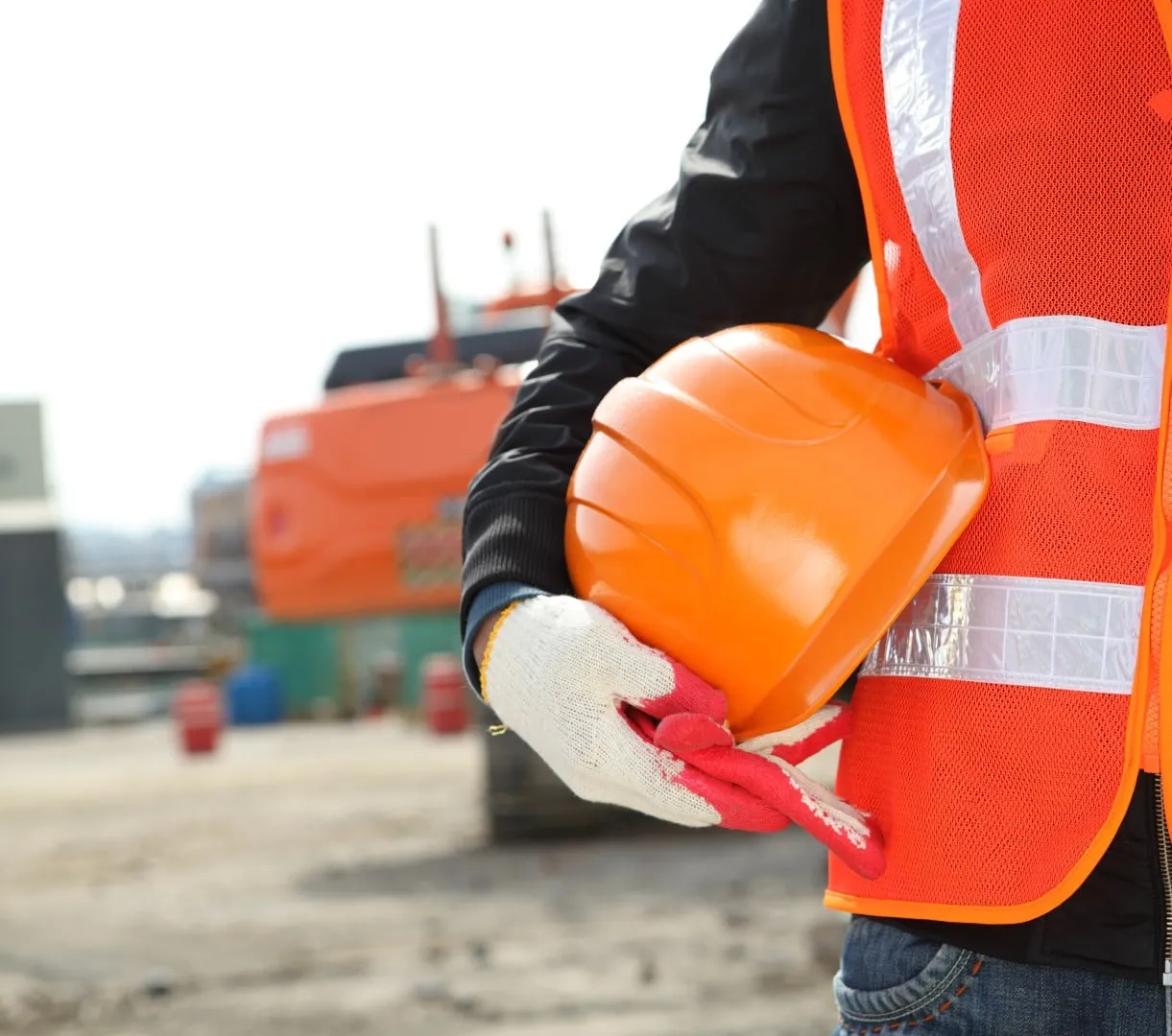 Worker in high-vis locking out an isolation point